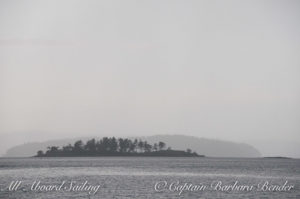 Rain over Yellow Island and Jones Island.