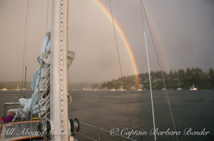Rainbow with sunset sail