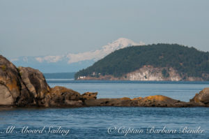 Looking towards Turn Point Lighthouse, Lovers Leap, and Mount Baker