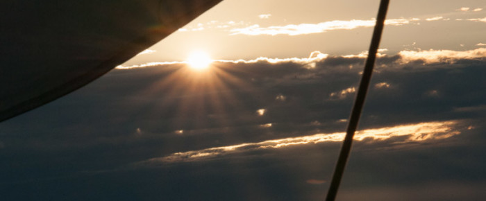 Summer solstice sunset moonrise sail