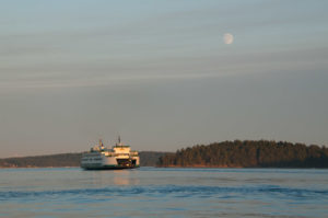 WA state ferry under full moon in San Juan Channel