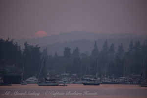 Sunset over Friday Harbor through forest fire haze