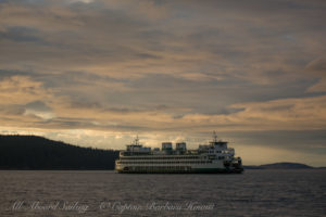 WA state ferry 'Samish'a at sunset, San Juan Island