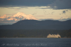 WA state ferry 'Samish'a at sunset with Mount Baker, San Juan Island