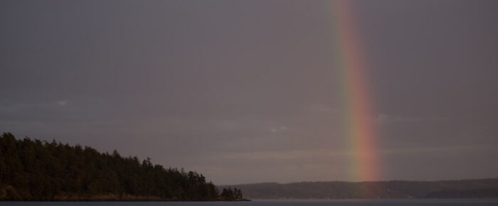 Sunset sail with rainbows