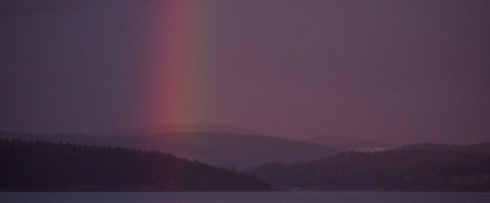 A sunset complete with rainbow A sunset complete with rainbow